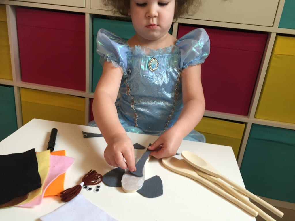 sticking the trunk onto the wooden spoon elephant