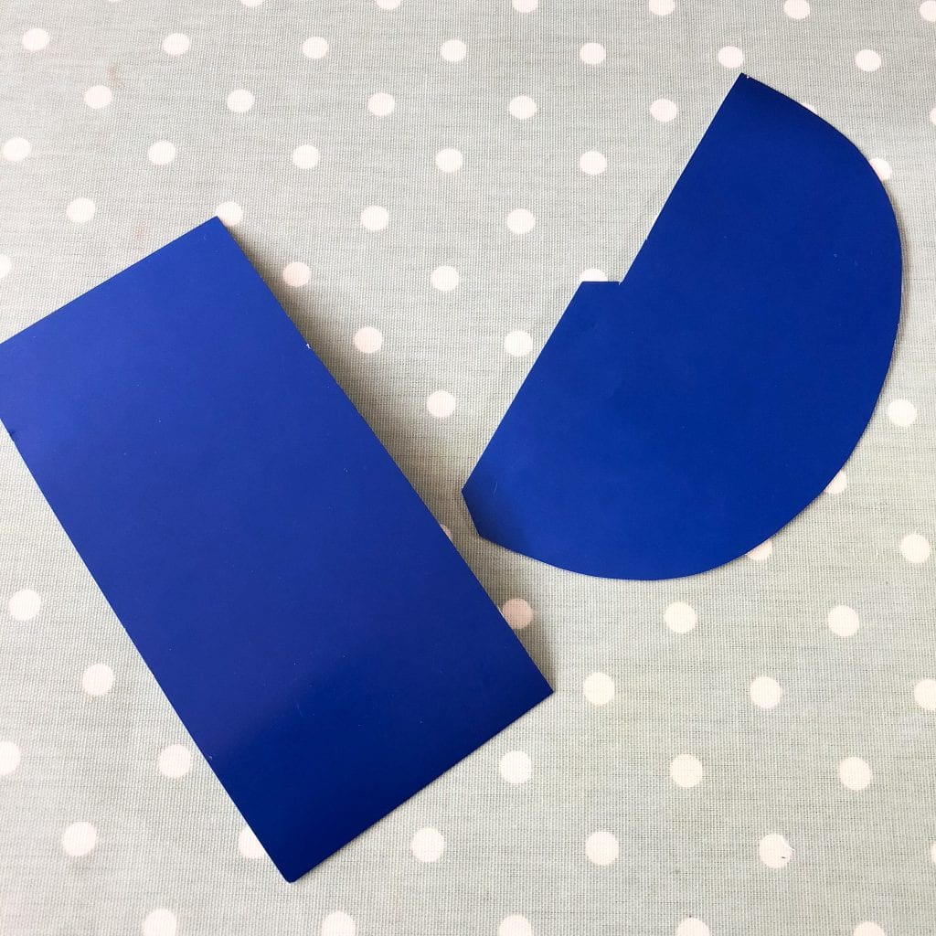 Blue Card cut into a semi-circle and rectangle
