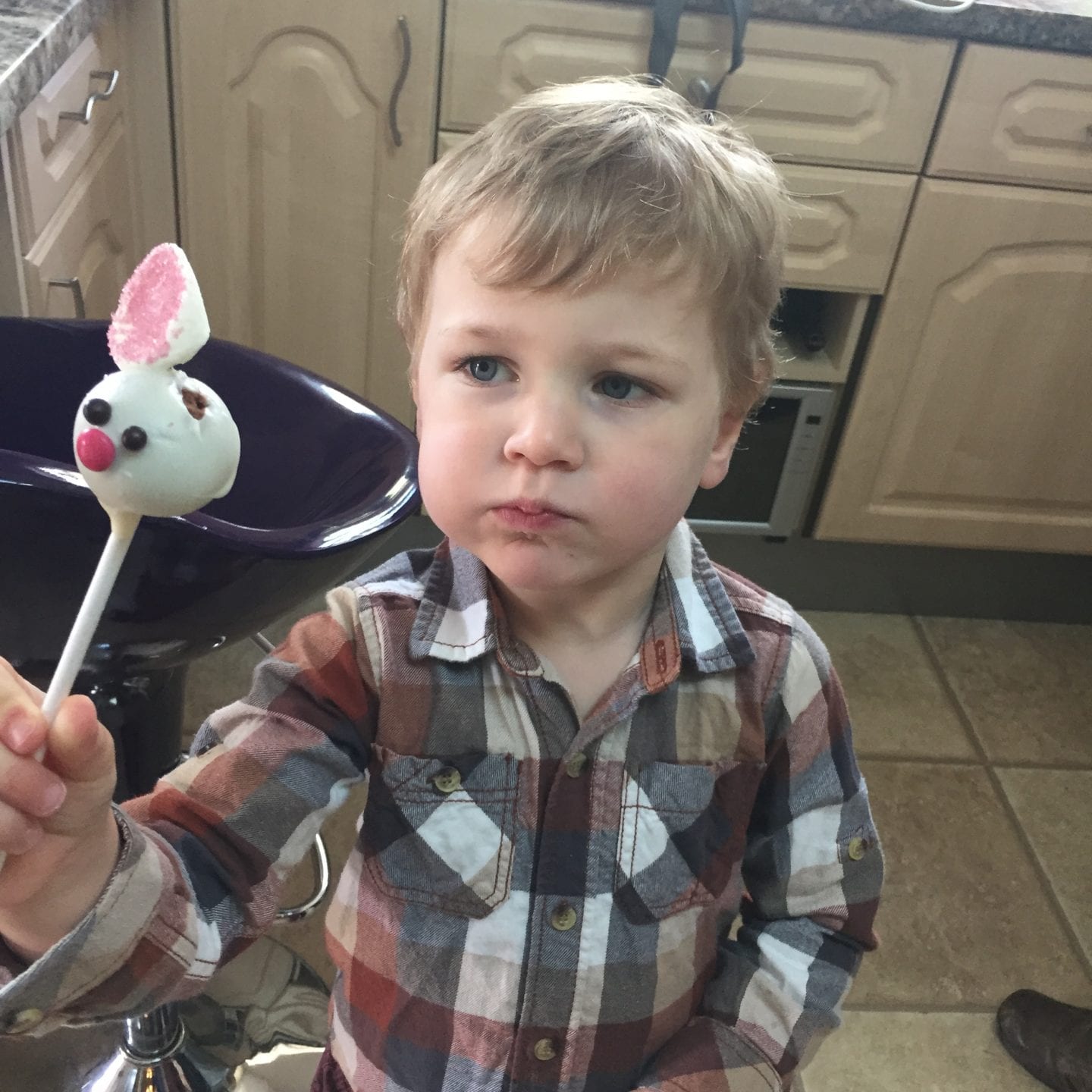 Oliver enjoying a bunny cake pop
