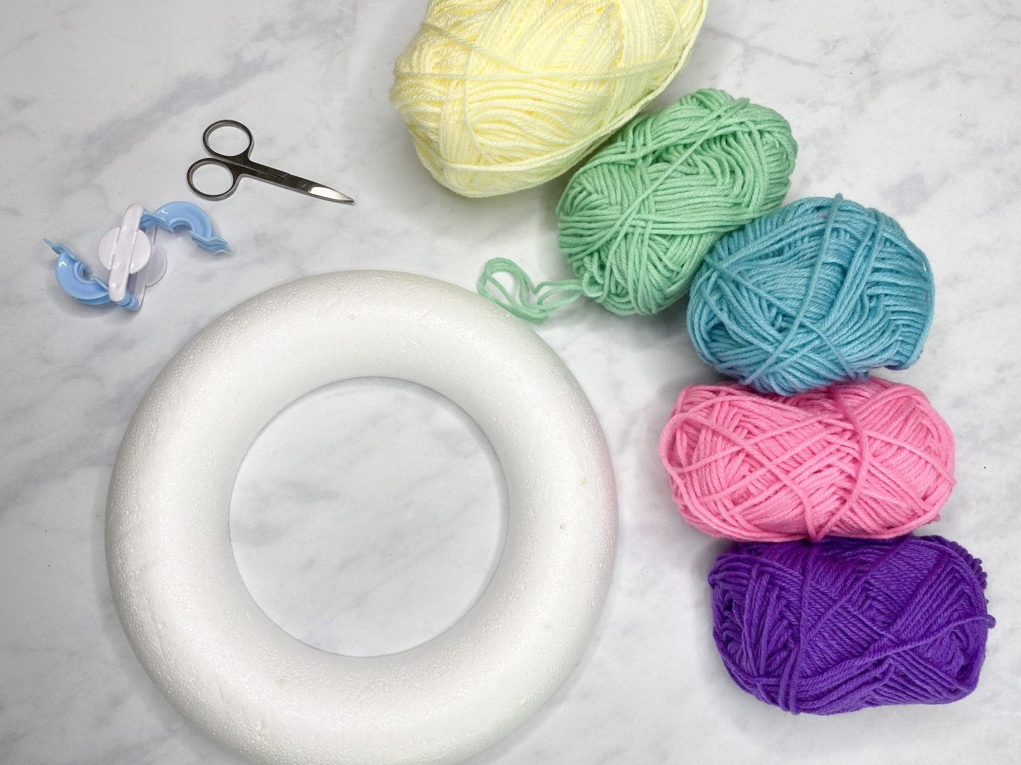 what you will need to make a rainbow pom pom wreath