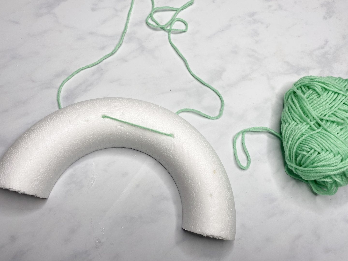 A polystyrene wreath cut in half