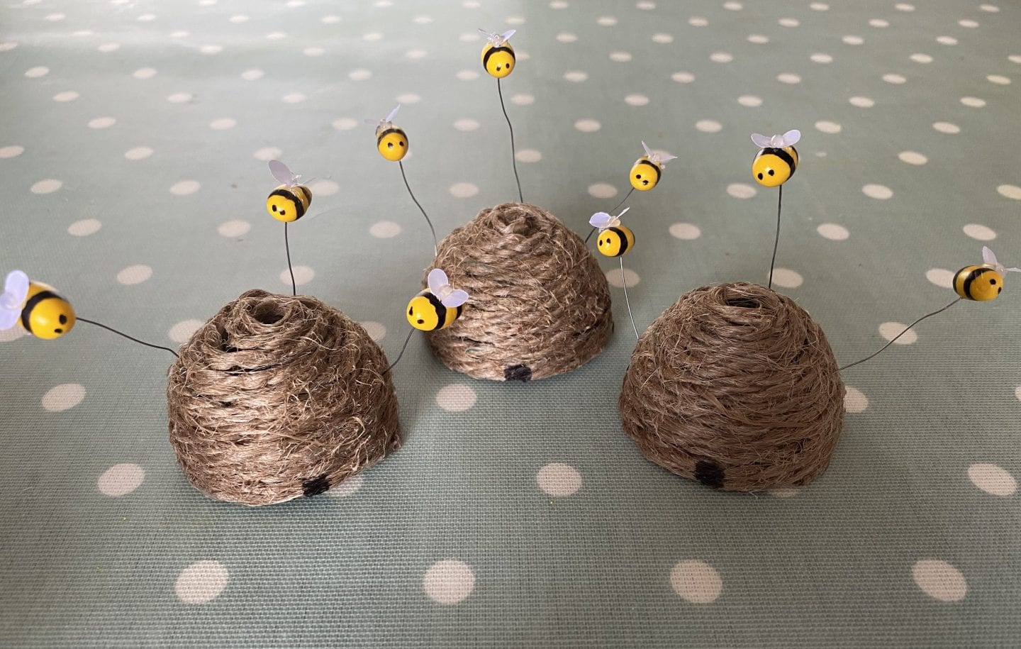 finished mini bee skeps with polymer clay bees