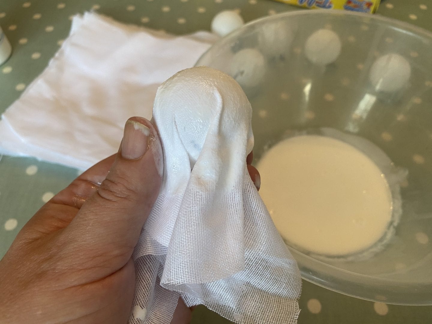 A piece of muslin fabric, dipped in fabric stifner and placed over a ping pong ball